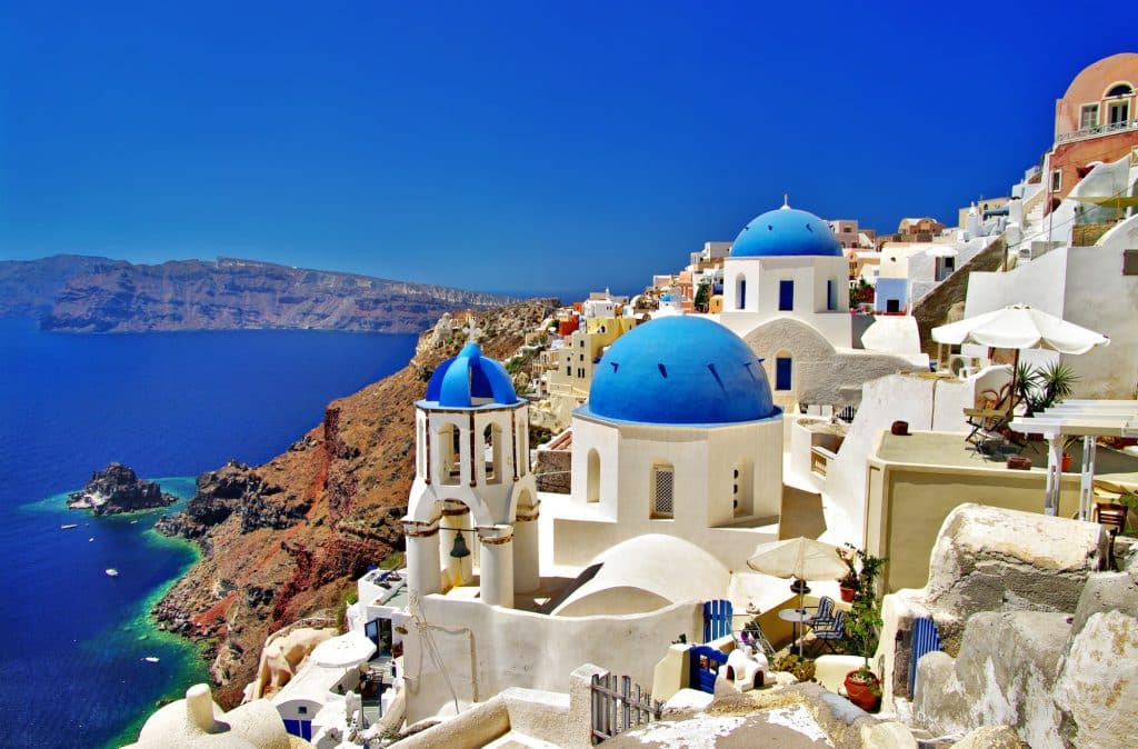 greece santorini island iconic view with blue churches oia village